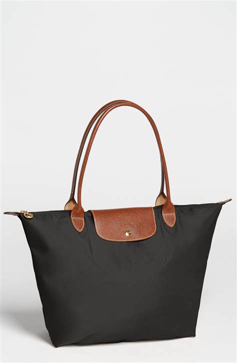 black longchamp canvas bag.